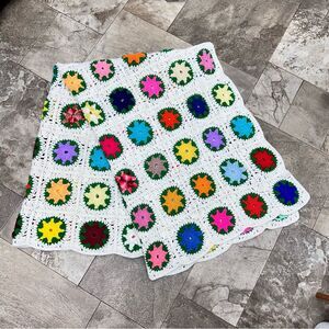 Vintage granny square quilt. the squares are almost like flowers Multicolored